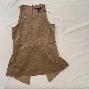 Sleeveless top with cut outs
